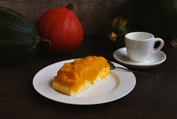 Pumpkin Cottage Cheese Cake. Cottage cheese sweet casserole with pumpkin layer on a plate. The...