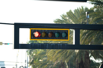 Overhead traffic lights high above street in Miami, Florida