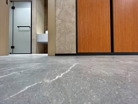 Modern Entryway with Venetian Plaster Walls, Marble Flooring, and View of a Contemporary Wardrobe and Bathroom