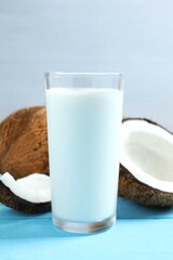 Glass of milk with coconuts on the table