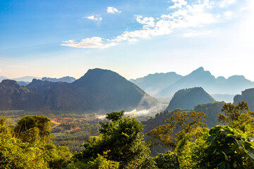 Obraz premium Mountain landscape with tropical jungle rocks in Vang Vieng Laos.