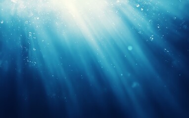 A serene underwater scene with light rays filtering through the water, creating a tranquil atmosphere.
