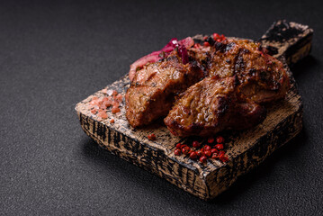 Pieces of beef meat cut into slices, marinated with salt and spices