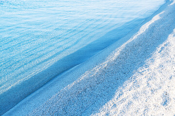 Beach of white quartz grains, like grains of rice, Arutas Beach