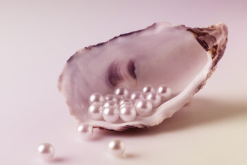 Beautiful white pearls on an oyster shell.