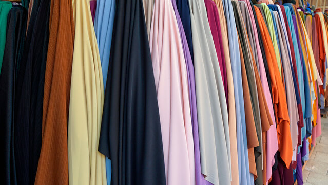 Colorful African garments displayed in sunlight