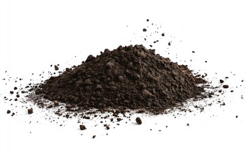 Close-up view of a mound of dark brown soil with small particles. Freshly disturbed soil with scattered particles. Light gray background provides contrast to the soil.