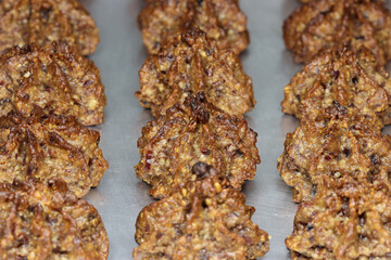 nut macaroons on aluminum baking tray