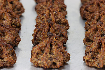 nut macaroons on aluminum baking tray