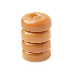 Stack of tasty hard toffee candies isolated on white