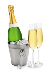 Champagne and bucket with ice isolated on white