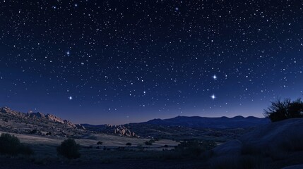 Naklejka premium A vast, star-filled night sky above a mountainous landscape with a few trees in the foreground.