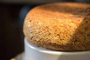 Freshly baked homemade bread is lying and cooling down.