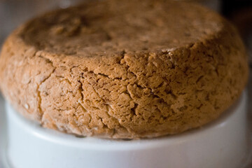 Freshly baked homemade bread is lying and cooling down.