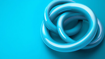 Blue intertwined rings on light background, abstract composition