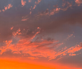 beautiful dark blue sky with orange sunset clouds