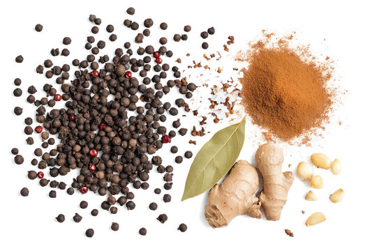 Spice blend mix includes cinnamon sticks, nutmeg, star anise, ginger root, ground chili peppers, coriander, cumin, garlic granules, allspice, sea salt, black pepper on isolated transparent background.