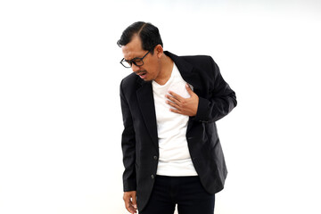 Asian businessman suffering from bad pain in his chest heart attack. Isolated on white