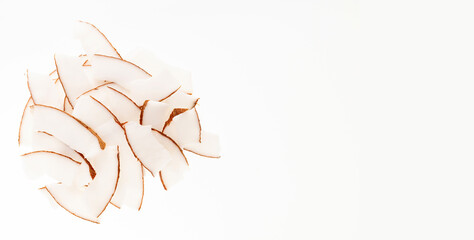 Cocos nucifera - Pile of dehydrated shredded coconut with sugar.