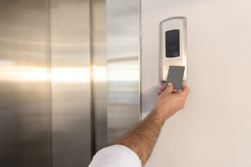 Woman hand holding mockup key card to lock and