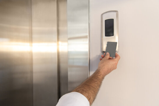 Woman hand holding mockup key card to lock and