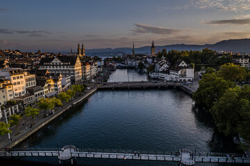Beautiful aerial view of the city of Zurich in Switzerland - the Limmat River and its iconic...