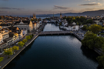 Beautiful aerial view of the city of Zurich in Switzerland - the Limmat River and its iconic...