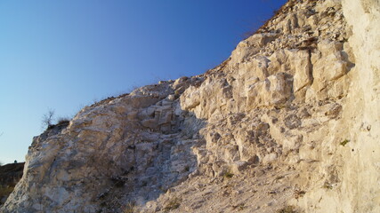 chalk, stone wall background, rock in the sun