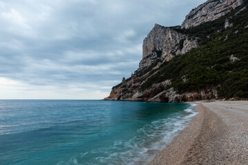 Obraz premium Cala Sisine Beach, Sardinia, Italy, Gulf of Orosei region. Emerald sea and cliffs. Awesome Sardinian landscape.