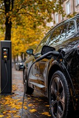 An electric car is charging at a roadside charging station.