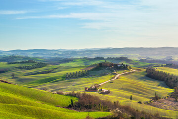 Obraz premium Rural landscape at sunset in the Crete Senesi. Tuscany, Italy