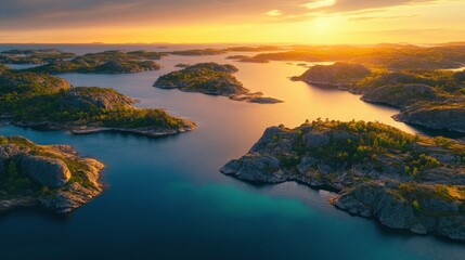 A beautiful ocean view with many islands and a few small ones. The water is blue and the sky is orange