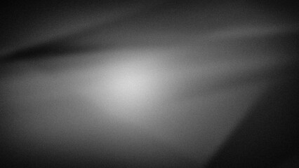 Minimalistic grayscale gradient background with soft black and white transitions and a grainy texture. Ideal for sleek digital designs and modern backdrops