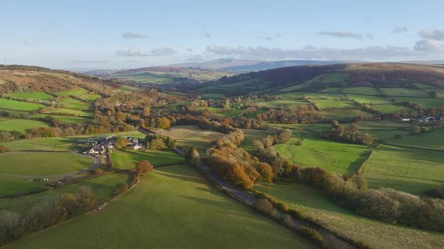 Farms over Trecastle from a drone at sunset, Brecon Beacons National Park, Powys, Wales, England