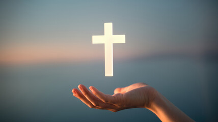 Obraz premium A person is holding a white cross in their hand, with their palm facing upwards. The hand is open and the cross is positioned above it, creating a sense of openness and peace