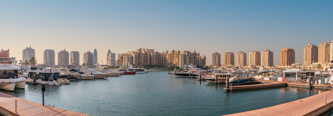 View of the Pearl Island in Qatar's capital Doha and boats on the shore