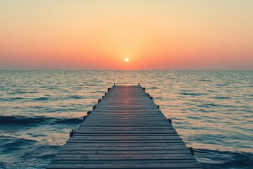 Fototapeta premium Wooden Pier at Sunset Over the Ocean