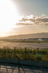 Landing strip at Barcelona airport with planes on the runway