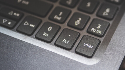 Fototapeta premium Keyboard button enter laptop black minimalist
