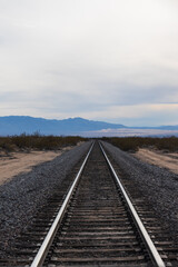 Fototapeta premium Train tracks through the desert