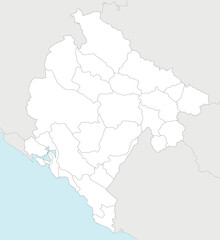 Obraz premium Vector regional blank map of Montenegro with municipalities and administrative divisions, and neighbouring countries and territories. Editable and clearly labeled layers.