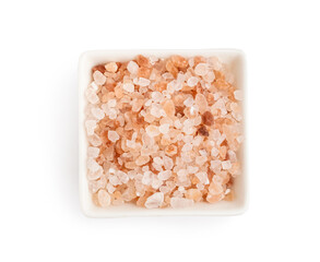 Bowl with Himalayan pink salt on white background