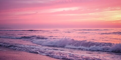 A gentle wave crashes upon the sandy shore, illuminated by a vibrant pink sunset sky, a moment of tranquility captured in the fleeting glow of the evening.