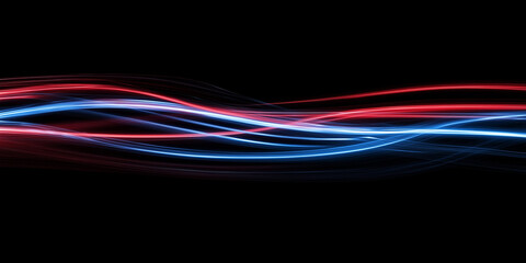 Abstract red and blue light trails flowing on black background