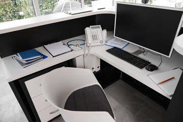 Receptionist's desk with computer in clinic