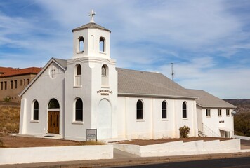 Fototapeta premium Historic Saint Cecilia's Mission, Famous Vintage Spanish Catholic Church Building Exterior in Clarkdale, Arizona Southwest USA