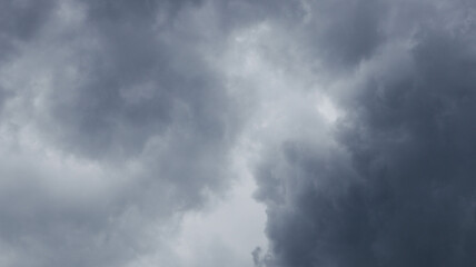 Overcast clouds dominate the evening sky, casting a moody and dramatic ambiance. The scene captures the essence of an approaching storm and the tranquil beauty of dusk.