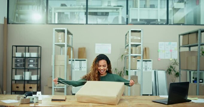 Reversed, packing and woman with logistics at office for small business, dropshipping and delivery. Happy, owner and person wrapping package at desk for supply chain, ecommerce and preparing order