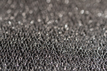 Horizontal blurred metallic surface.Pure silver wire mesh.