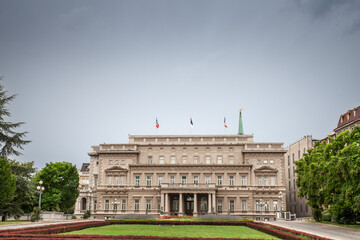 Obraz premium Main facade of stari Dvor, the City Hall of Belgrade, also called skupstina, during a cloudy rainy afternoon. It is the seat of the municipal administration of the city of Belgrade, capital of Serbia.